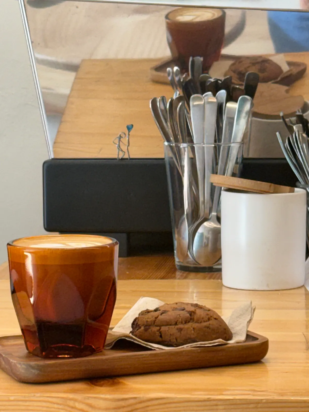 Cortado and chocolate cookie at the Bruma Roasting bar